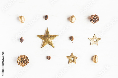 Christmas composition. Pattern made of christmas decoration, pine cones. Flat lay, top view