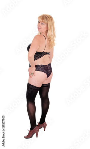 Woman in lingerie from back.