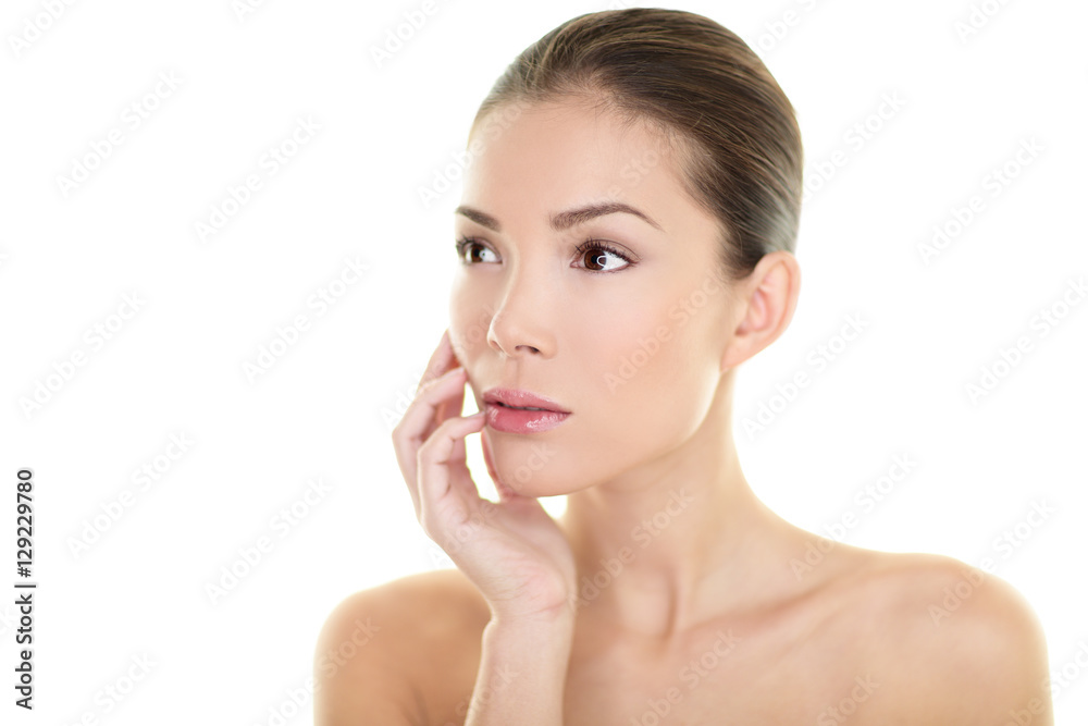 Skincare Asian beauty woman touching face skin portrait in studio isolated on white background. Natural makeup body care spa clear and clean skin.