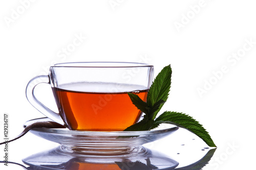 Cup of tea and mint on a white background