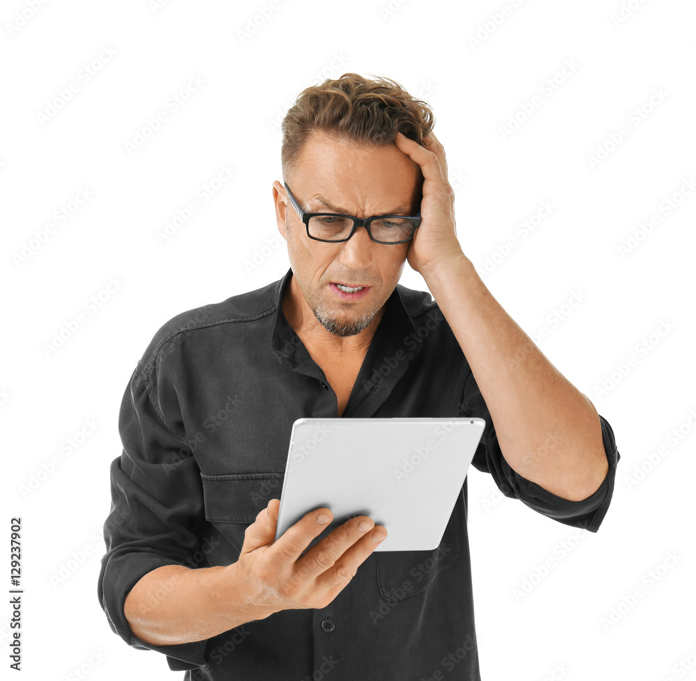 Senior handsome man with tablet on white background Senior handsome man with tablet on white background