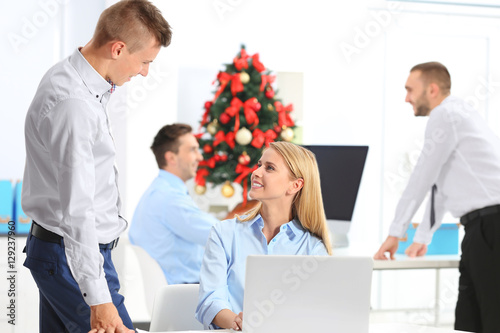 Young colleagues in office ...