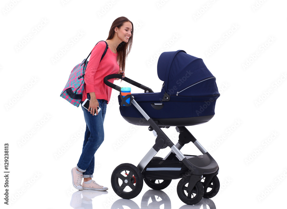Full length portrait of mother with a stroller, isolated on white background