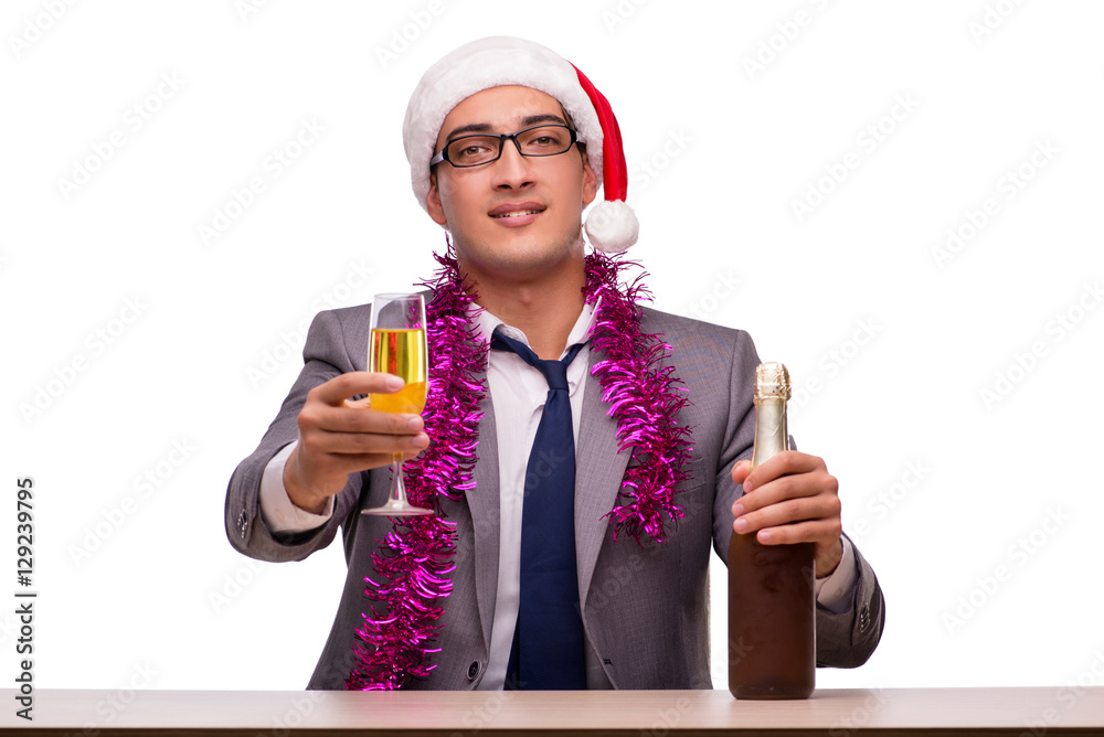 Young businessman celebrating christmas in office Young businessman celebrating christmas in office