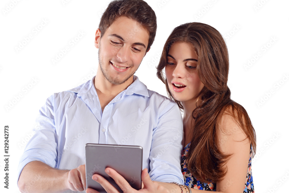 Couple using digital tablet. Couple using digital tablet.
