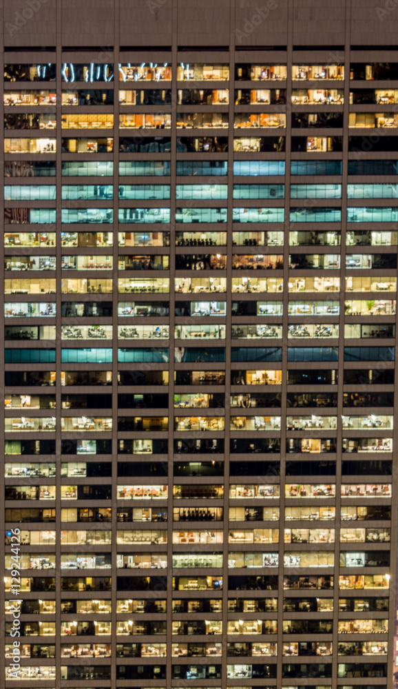 Office windows illuminated at night Office windows illuminated at night