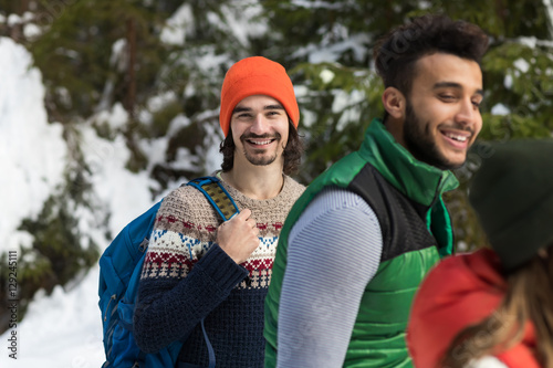 Man With Rucksack People Group Snow Forest Young Friends Walking Outdoor Winter Pine Woods