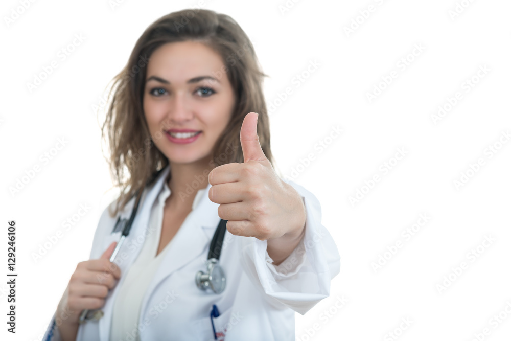 Female doctor with thumbs up isolated over a white background Female doctor with thumbs up isolated over a white background
