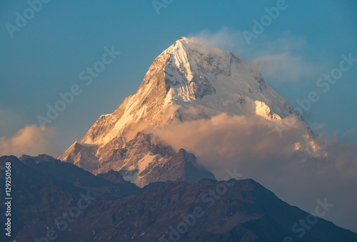 The Annapurna South during the sunset view from Ghorepani village in Annapurna region, Nepal. © boyloso