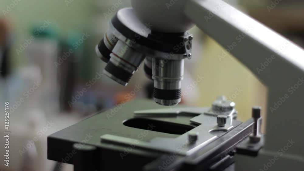 Microscope Laboratory Analysis Bacterial colonies in Petri plates. Medical tests and research. Microscope Laboratory Analysis Bacterial colonies in Petri plates. Medical tests and research.