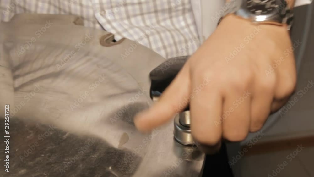 The Autoclave is Closed Tests Male hand in a laboratory autoclave preparation for launch The Autoclave is Closed Tests Male hand in a laboratory autoclave preparation for launch