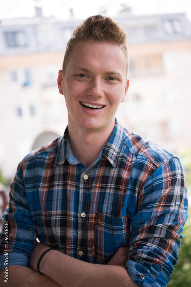 man standing at balcony man standing at balcony