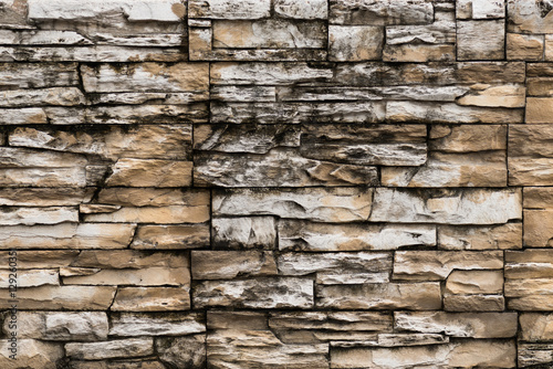 rustic sandstone tile wall for background