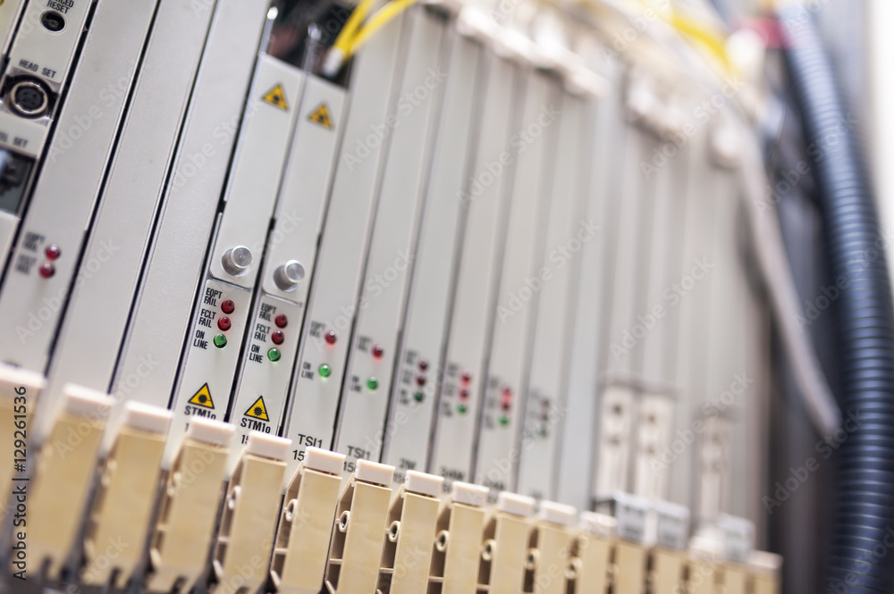fiber optic with servers in a technology data center fiber optic with servers in a technology data center