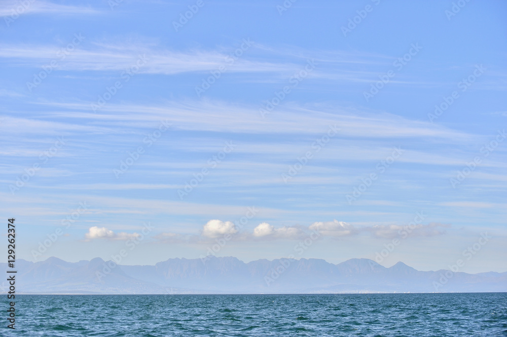 Blue sea and clouds on sky