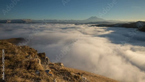 Russia, timelapse. The formation and movements of clouds up to the steep slopes of the  mountains of Central Caucasus peaks.