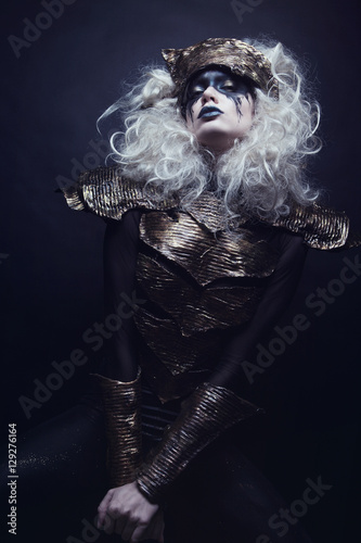 Woman with black make up and white wig  © EVGENY FREEONE