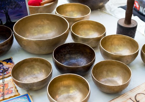 Tibetan Singing bowls are on the market counter