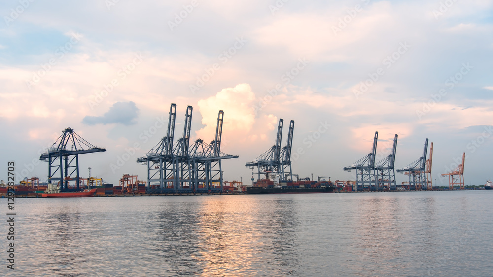 Obraz premium Containers loading by crane in the morning , Trade Port , Shipping