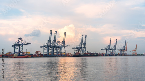 Containers loading by crane in the morning   Trade Port   Shipping