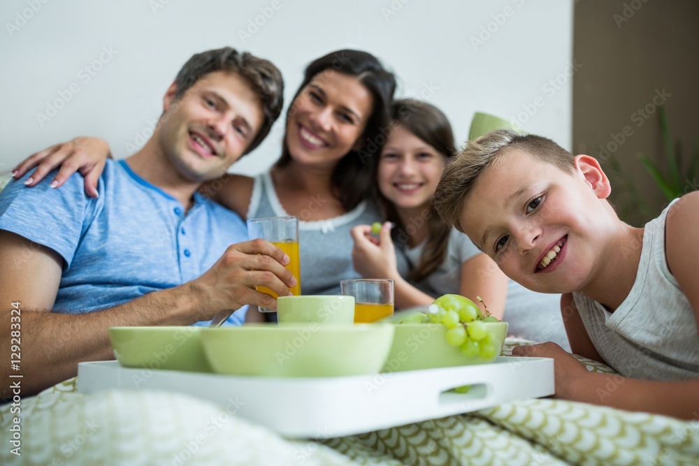 Portrait of family having breakfast