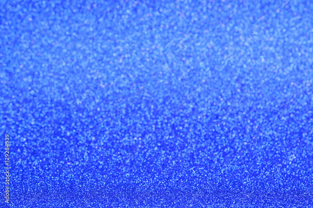 Obraz premium Defocused blue glitter background