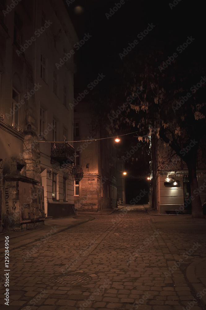 Old European city street at night
