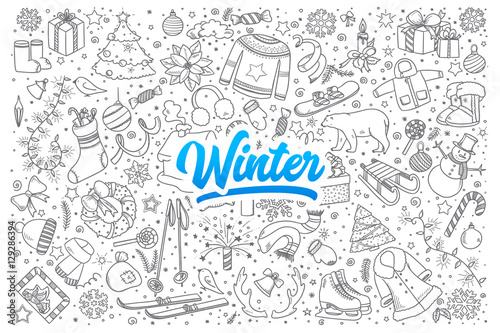 Hand drawn set of winter doodles with blue lettering in vector