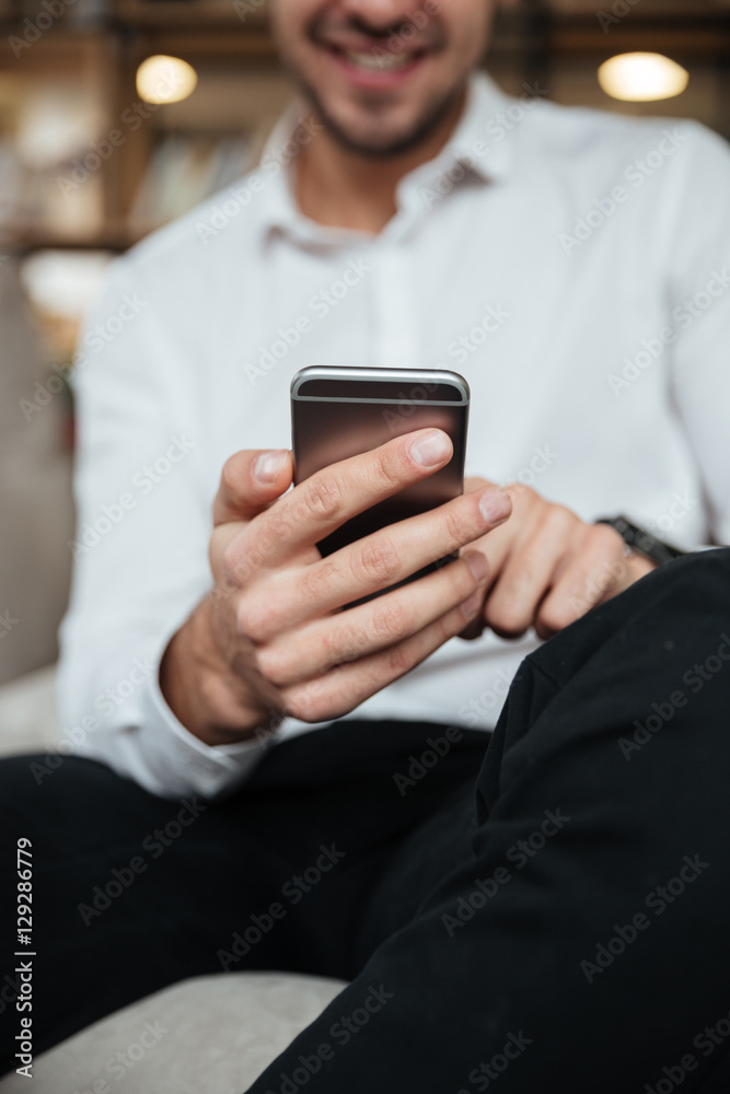 Cropped photo of businessman chatting by phone Cropped photo of businessman chatting by phone