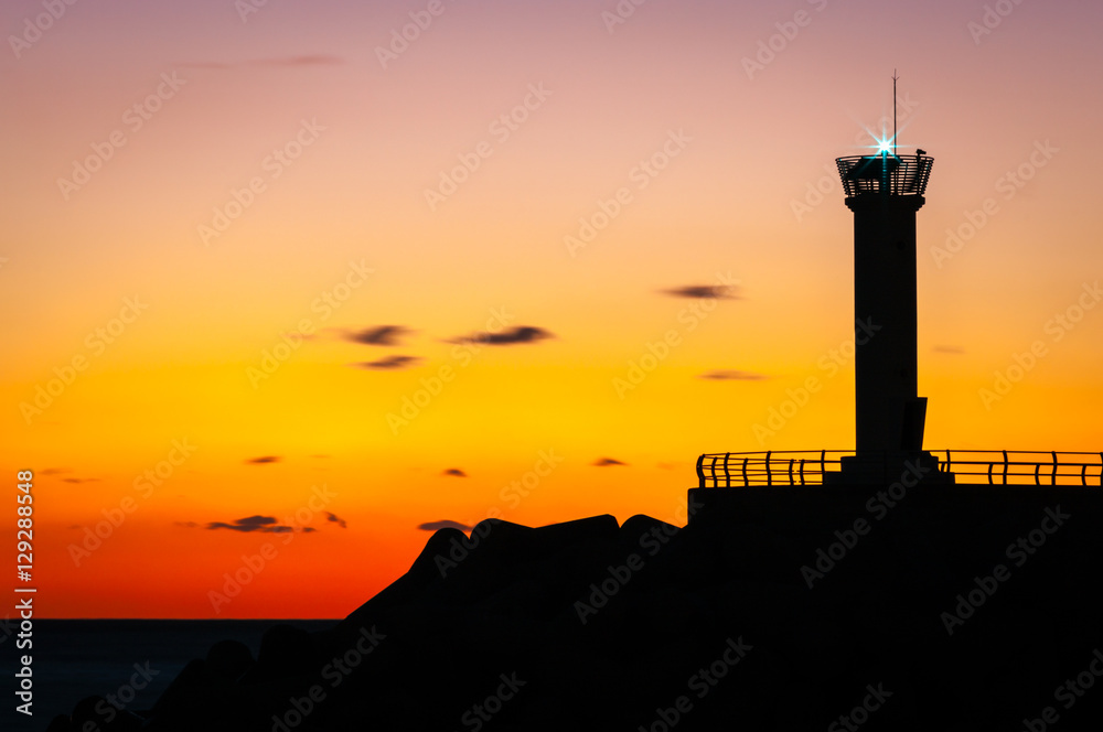Lighthouse on the coast at night in Ulleungdo Island South Korea. Nov 2016.