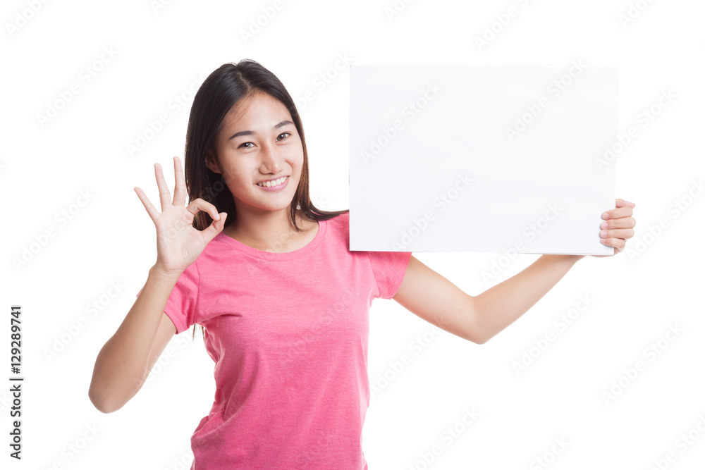 Young Asian woman show OK with white blank sign Young Asian woman show OK with white blank sign