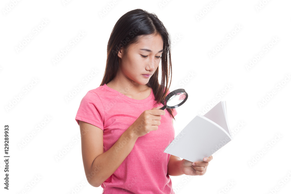 Asian woman with a book and magnifying glass Asian woman with a book and magnifying glass