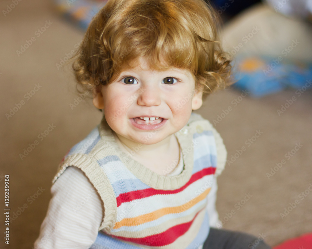 The kid plays with toys at home . Portrait of a boy at home
The kid plays with toys at home . Portrait of a boy at home