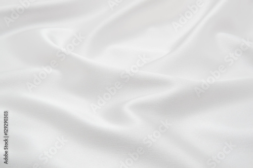 white satin fabric as background © nata777_7