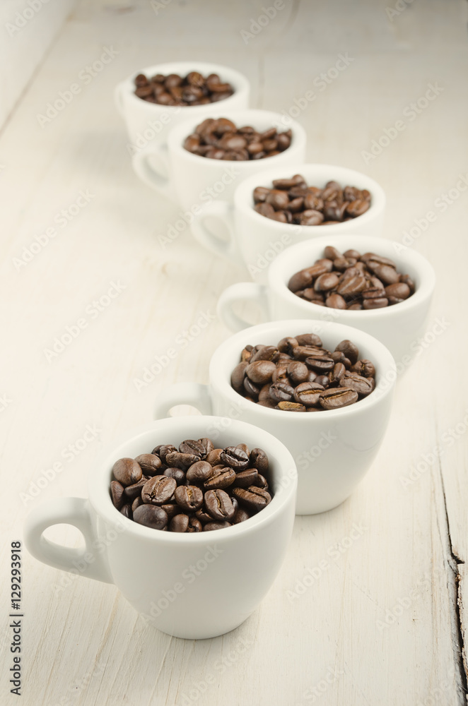 Coffee. Coffee cups and coffee beans. Coffee. Coffee cups and coffee beans.