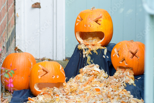 Scary Halloween pumpkins throwing up their insides