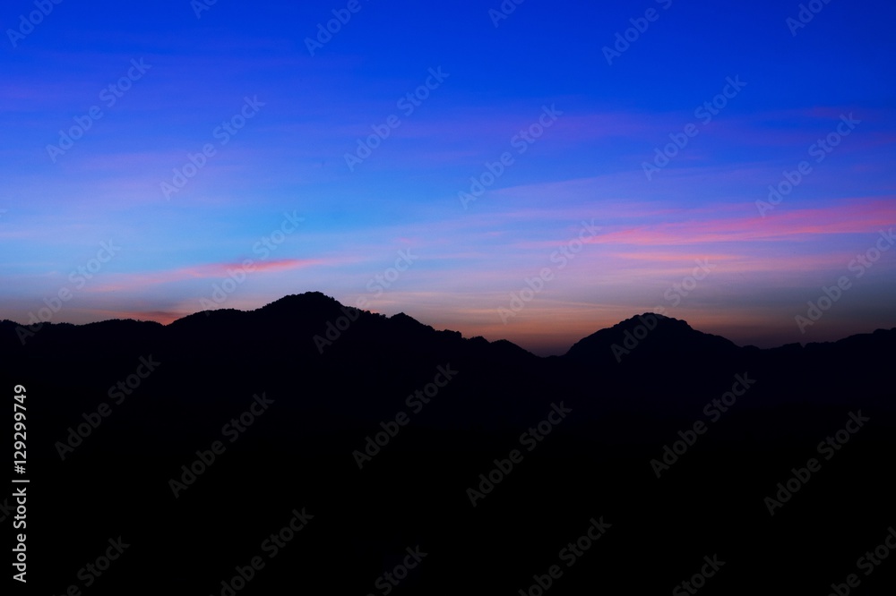 Obraz premium Beautiful silhouette landscape at night on a meadow on early winter