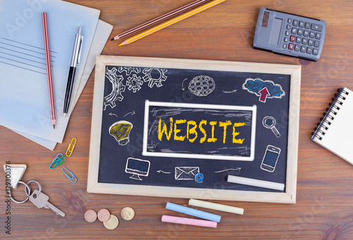 Website, Domain HTML Web Design Concept. Chalkboard on wooden office desk.