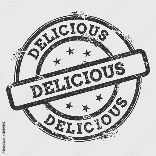 Delicious rubber stamp isolated on white background. Grunge round seal with text, ink texture and splatter and blots, vector illustration.