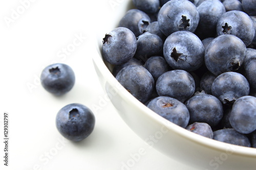 european blueberry fruits in a small white bowl
