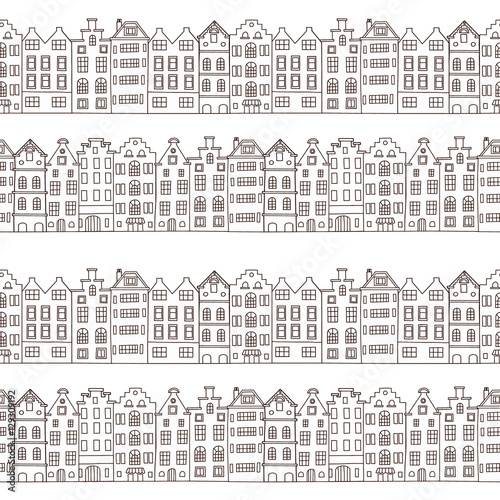 Seamless pattern with cute houses in black and white colors