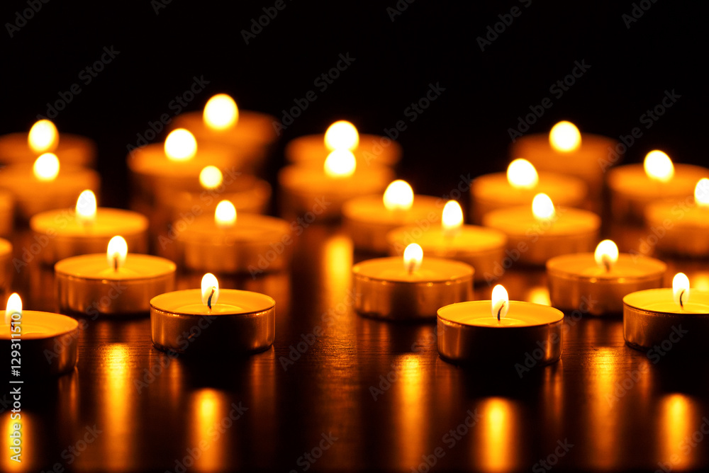 Many burning candles with shallow depth of field