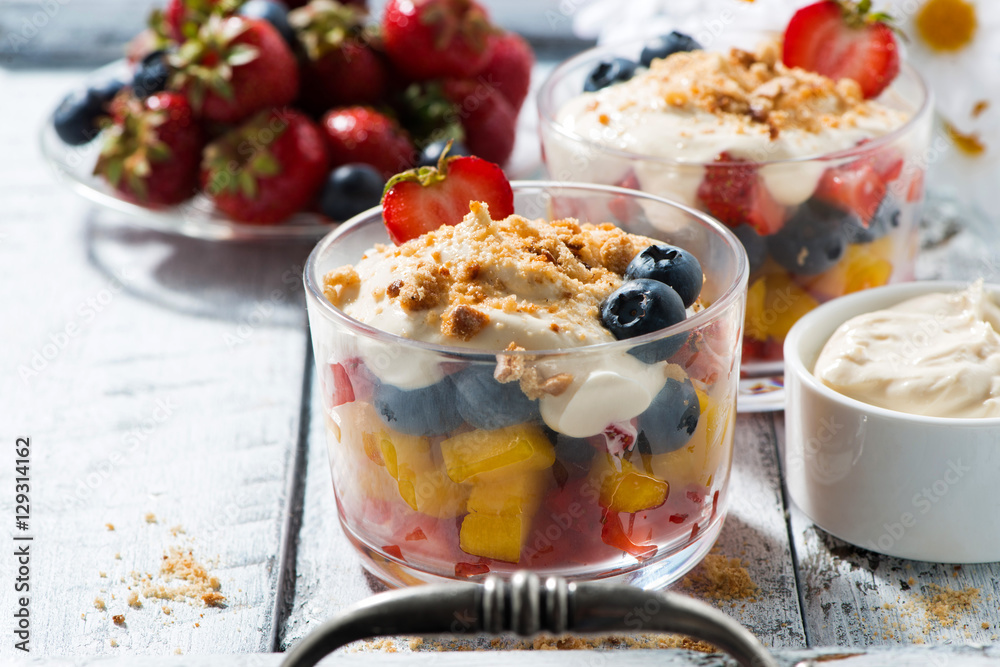 fresh fruit dessert with custard in glasses, closeup fresh fruit dessert with custard in glasses, closeup
