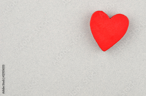 Heart on cardboard background