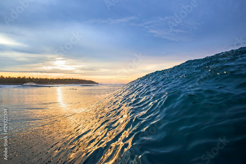 reflection of sunlight on the ocean water photo