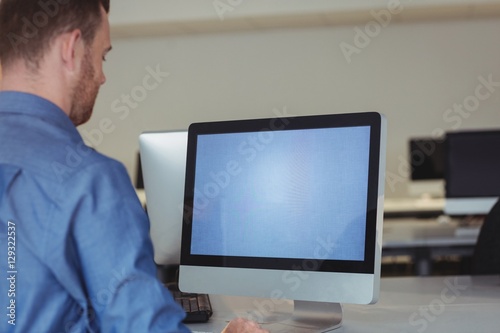 Mature student using computer