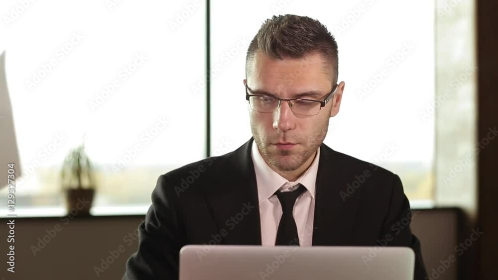 Businessman working with documents in the office Businessman working with documents in the office