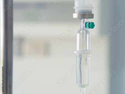 Saline intravenous (iv) drip in hospital. Health care and Medical equipment concept.