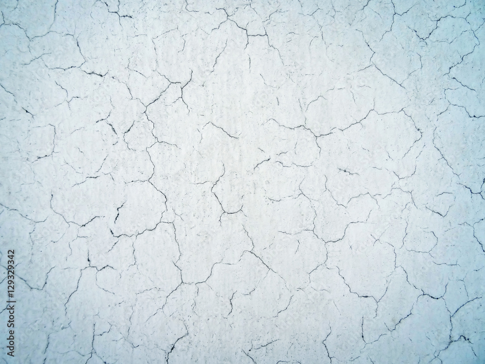 Grunge concrete cement wall with crack in industrial building Grunge concrete cement wall with crack in industrial building