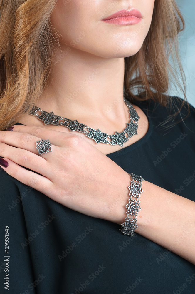 silver jewelry on the human model